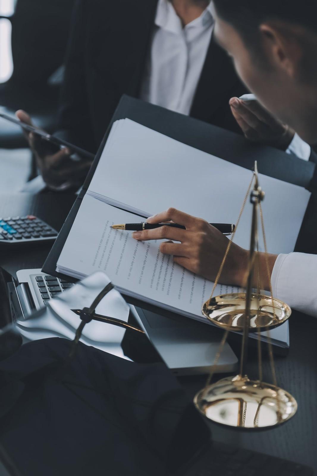 Legal research team working with documents