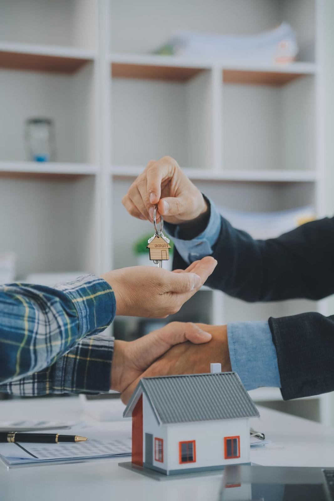 Real estate team reviewing property contracts